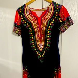 This is a medium fit dress that can also wear as Lg, with beautiful colours.